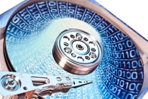 Why is it important to consider more expensive hard drives?